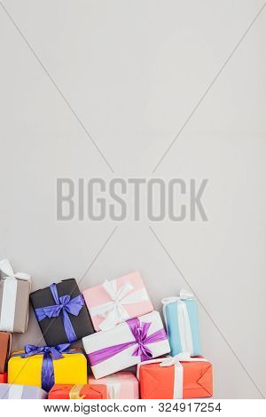 Multicolored Birthday Presents On A Grey Background