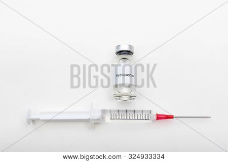 Medical Concept Showing Medical A Medical Vial Reading Hydrocodone And A Syringe