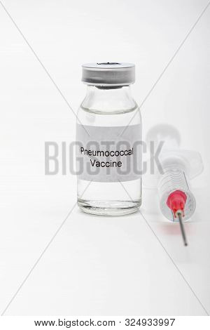 Medical Concept Showing Medical A Medical Vial Reading Pneumococcal Vaccine And A Syringe