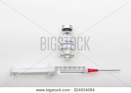 Medical Concept Showing Medical A Medical Vial Reading Tick-borne Encephalitis Vaccine And A Syringe
