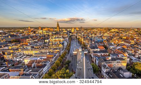Aerial Skyline View Of Historic Groningen City Centre At Vismarkt Area Under Setting Sun. The Nether
