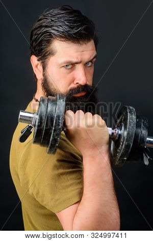 Bearded Man With Dumbbell During Exercise. Strong Handsome Sport Man Making Weightlifting. Muscular 