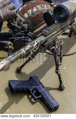 Modern Powerful Sniper Rifle With A Telescopic Sight Mounted On A Bipod.elements Of The Sniper Rifle