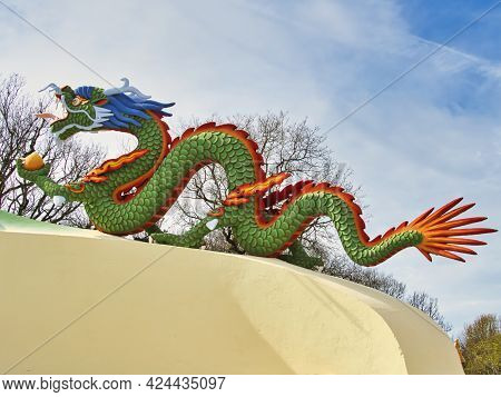 La Boulaye, France - April Circa, 2018. Close Up Of A Colorful Dragon On An Rooftop Of The One Thous