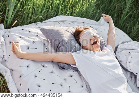 Happy Yawning Female Wearing Sleeping Fold And White Casual T-shirt Stretching Arms When Waking Up I