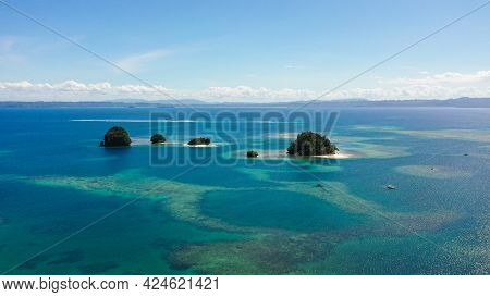 Aerial Seascape Of A Beautiful Island With A Beach And Blue Clear Water. Britania Islands, Surigao D