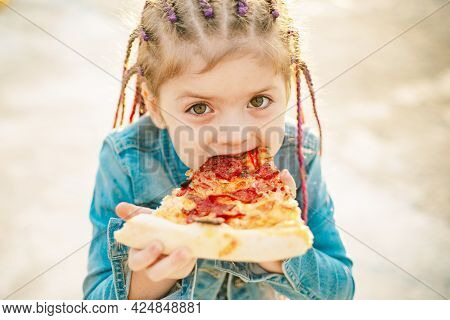 Kid Eat Pizza. Child Eating Pizza. Fastfood For Kids. Italian Junkfood. Children Favorite Food.