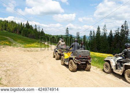 Slavsk. Ukraine. June 20. 2021. Tourists On Atvs On A Mountain Road. Extreme Vacation. Carpathian Mo