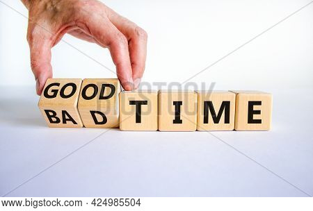 Good Or Bad Time Symbol. Businessman Turns Wooden Cubes And Changes Words 'bad Time' To 'good Time'.