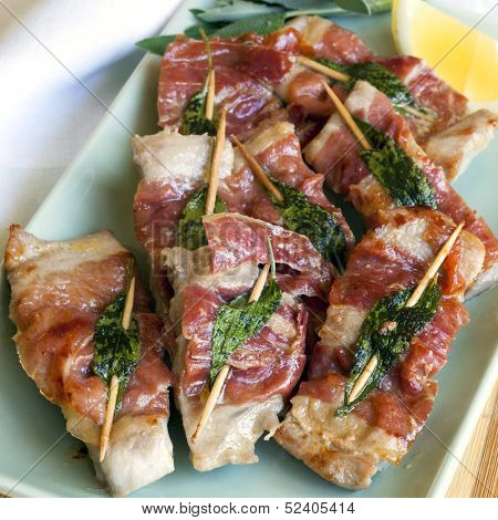 Veal saltimbocca.  Traditional dish with prosciutto and sage.