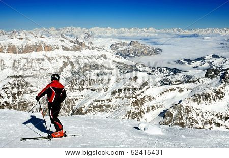 Ski resort Italy, Skier standing on Marmolada, 3342 m