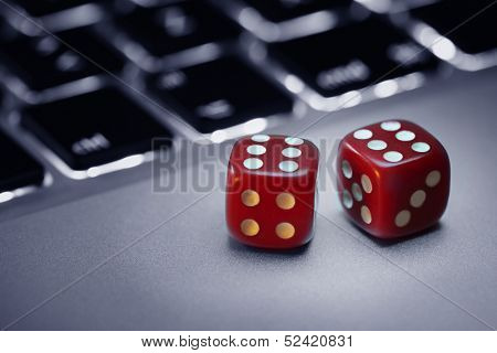 Dice on computer keyboard