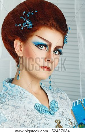 Geisha In A Smart Dress