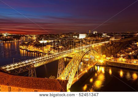 Panorama of lighted famous bridge Ponte dom Luis