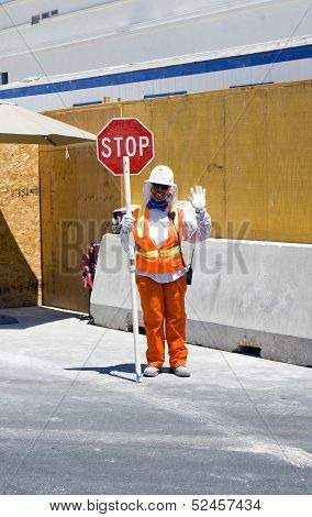 Woman Assecurity Guard Is Regulating The Access