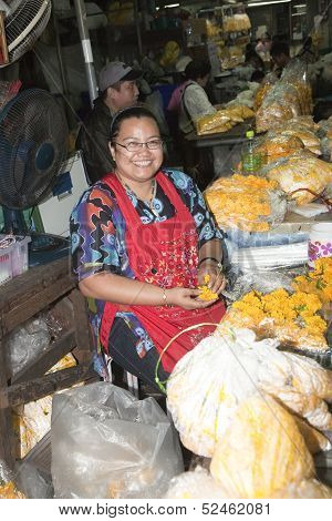 Women Are Selling Fresh Flowers At The Morning Market