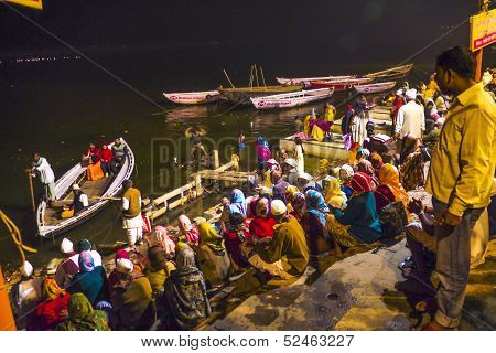 People In The Night In Varanasi In Religious Washing Ceremony