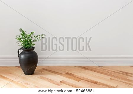 Amphora With Green Plant Decorating A Room