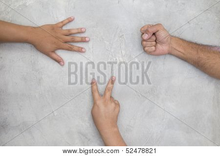 Three man's hand gestures. Rock Paper Scissors game