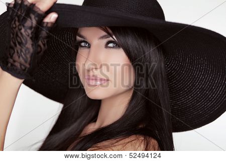 Fashion Brunette Woman Model Posing In Black Hat Isolated On White Background