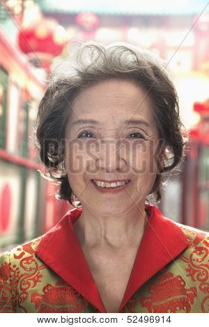 Portrait of senior woman in Chinese traditional clothing