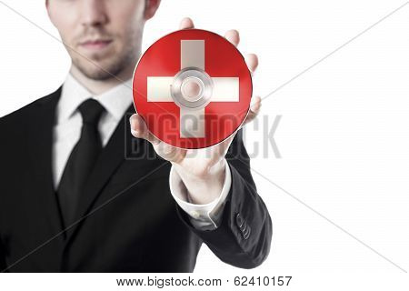 man holding cd swisse