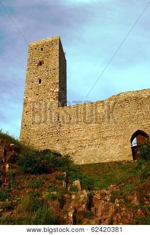 Ruined medieval castle with towers