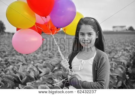 A Teenage Girl In Purple With Colorful Balloons