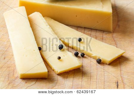 Sliced cheese with peppers