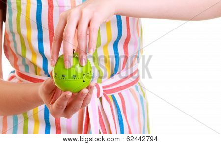 Closeup Housewife Or Chef In Kitchen Apron Using Apple Timer