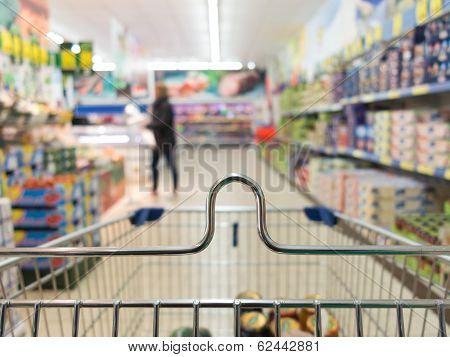 View From Shopping Cart Trolley At Supermarket Shop. Retail.