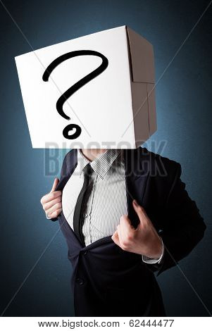 Businessman standing and gesturing with a cardboard box on his head with question mark