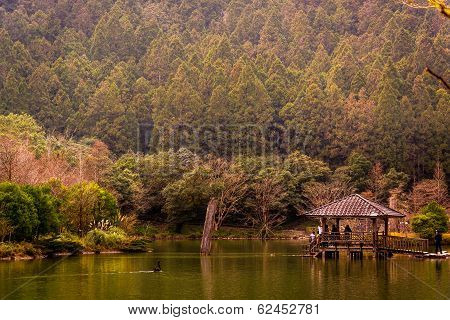 Chinese pavilion on a peaceful lake