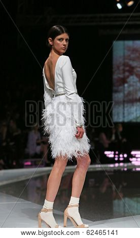 ZAGREB, CROATIA - MARCH 27: Fashion model wearing clothes designed by Mihano Momosa on the 'Fashion.hr' show on March 27, 2014 in Zagreb, Croatia