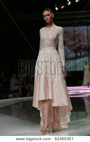 ZAGREB, CROATIA - MARCH 27: Fashion model wearing clothes designed by Mihano Momosa on the 'Fashion.hr' show on March 27, 2014 in Zagreb, Croatia