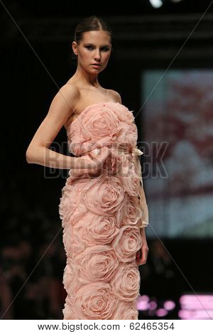 ZAGREB, CROATIA - MARCH 27: Fashion model wearing clothes designed by Mihano Momosa on the 'Fashion.hr' show on March 27, 2014 in Zagreb, Croatia