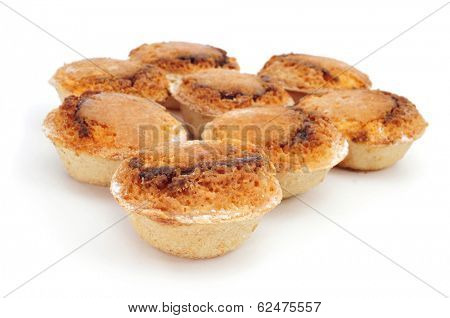 some pasteis de feijao typical Portuguese pastries, on a white background