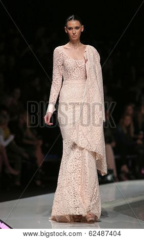 ZAGREB, CROATIA - MARCH 27: Fashion model wearing clothes designed by Mihano Momosa on the 'Fashion.hr' show on March 27, 2014 in Zagreb, Croatia