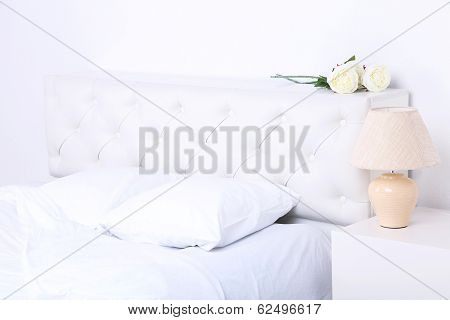 Comfortable soft bed with pillows
