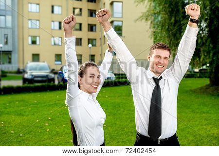 Young business couple outdoor