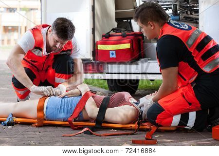 Senseless Woman Lying On Stretcher