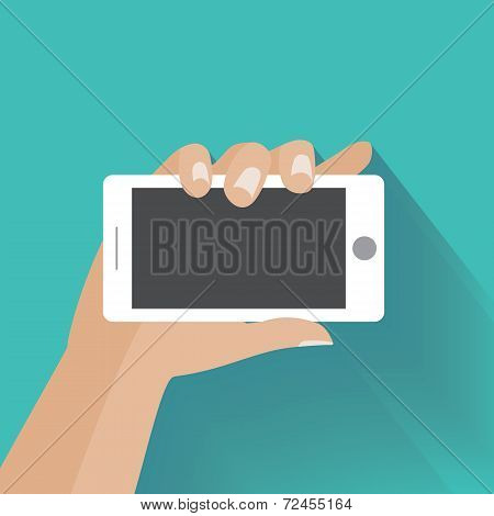 Hand holding smartphone with blank screen