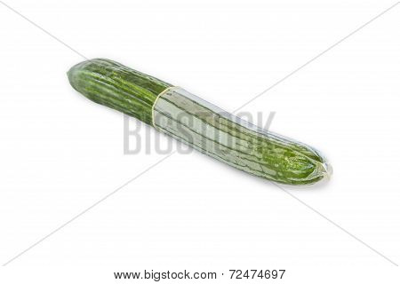 Cucumber With Condom On White