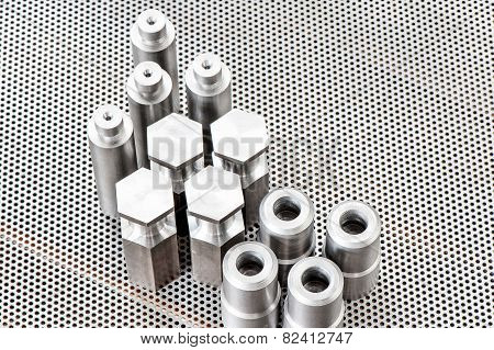 Iron Details - Shafts Bolts Nuts And Cylinders. Metal Engineering.