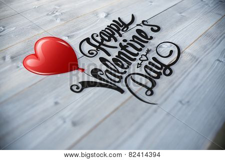 Cute valentines message against bleached wooden planks background