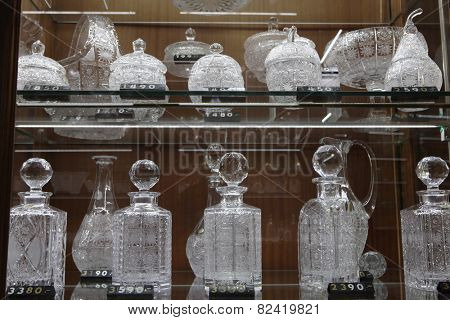 PRAGUE, CZECH REPUBLIC - NOVEMBER 9, 2014: Bohemian glass offered by the souvenir shop Erpet Bohemia Crystal at Old Town Square in Prague, Czech Republic. 