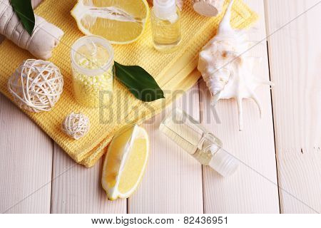 Spa still life with towel on wooden planks background