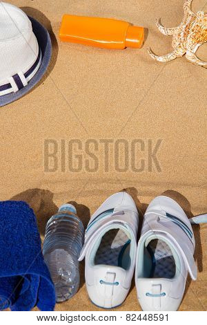 Summer Sport Concept - White Sneakers In Sand