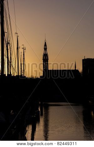 Silhouette Of Sailing Boats And The Jozef Cathedral In Groningen
