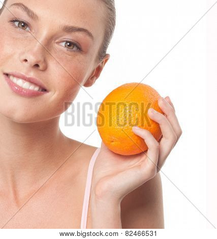 beauty portrait of attractive young caucasian smiling woman isolated on white studio shot with orange fruit